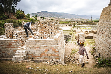 Brick workers near Ranomafana, Haute Matsiatra Region, Madagascar, Africa