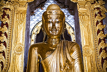 Gold Buddha statue at a Buddhist Temple at Inle Lake, Shan State, Myanmar (Burma)