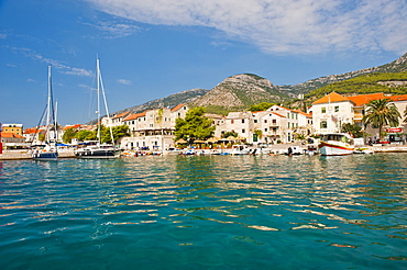 Bol Town and the crystal clear Adriatic Sea off Brac Island, Dalmatian Coast, Adriatic, Croatia, Europe 