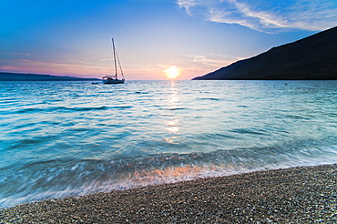 Adriatic Sea off Zlatni Rat Beach at sunset, Bol, Brac Island, Dalmatian Coast, Croatia, Europe 