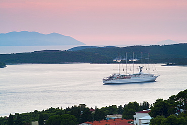 Mediterranean cruise ship at sunset, Hvar Town, Hvar Island, Dalmatian Coast, Adriatic, Croatia, Europe