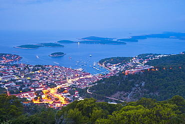 Hvar Town and the Pakleni Islands (Paklinski Islands) at night, Dalmatian Coast, Adriatic Sea, Croatia, Europe