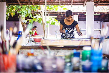 Sri Lankan woman batik painting near Anuradhapura, Central Province, Sri Lanka, Asia 