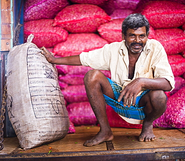 Portrait of a worker at Dambulla vegetable market, Dambulla, Central Province, Sri Lanka, Asia