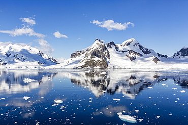 Snow-capped mountains in the Errera Channel on the western side of the Antarctic Peninsula, Antarctica, Southern Ocean, Polar Regions