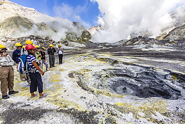 Visitors at an active andesite stratovolcano on White Island, North Island, New Zealand, Pacific