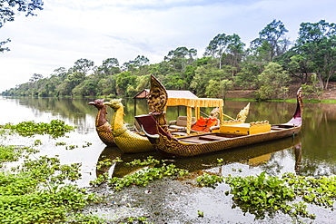 Ornate tourist boats near the South Gate at Angkor Thom, Angkor, UNESCO World Heritage Site, Siem Reap Province, Cambodia, Indochina, Southeast Asia, Asia