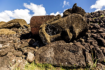 Fallen moai head and red scoria topknot at Ahu Akahanga on Easter Island (Isla de Pascua) (Rapa Nui), UNESCO World Heritage Site, Chile, South America