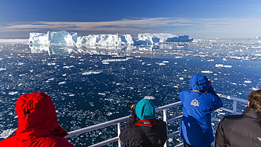 The National Gepographic Explorer amongst huge icebergs calved from the Ilulissat Glacier, UNESCO World Heritage Site, Ilulissat, Greenland, Polar Regions