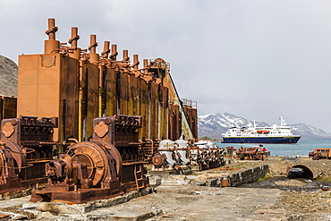 The Lindblad Expeditions ship National Geographic Explorer at anchor at the abandoned whaling station in Grytviken, South Georgia, UK Overseas Protectorate, Polar Regions