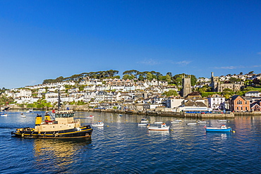 Early morning light on small boats at anchor in the harbour at Fowey, Cornwall, England, United Kingdom, Europe