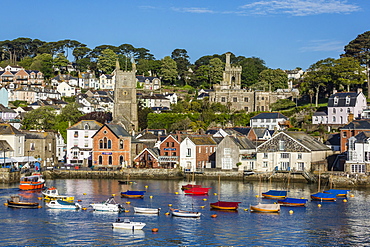 Early morning light on small boats at anchor in the harbour at Fowey, Cornwall, England, United Kingdom, Europe