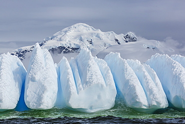 Wind and water sculpted iceberg in Orne Harbor, Antarctica, Polar Regions