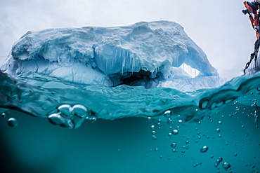 Above and below water view of iceberg at Booth Island, Antarctica, Polar Regions