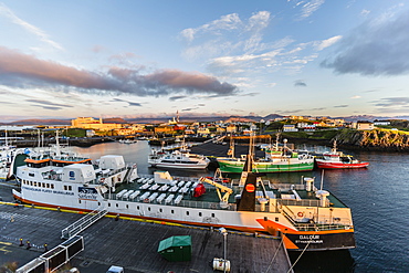 The harbor town of Stykkisholmur as seen from the small island of Stykkia on the Snaefellsnes Peninsula, Iceland, Polar Regions