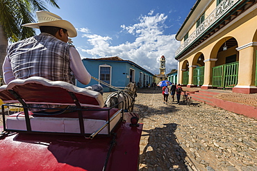 A horse-drawn cart known locally as a coche in Plaza Mayor, Trinidad, UNESCO World Heritage Site, Cuba, West Indies, Caribbean, Central America