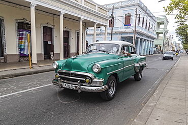 Classic 1950s Chevrolet Bel Air taxi, locally known as almendrones in the town of Cienfuegos, Cuba, West Indies, Caribbean, Central America