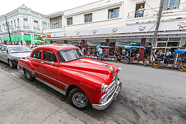 Classic 1950s Pontiac taxi, locally known as almendrones in the town of Cienfuegos, Cuba, West Indies, Caribbean, Central America