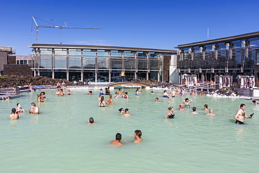 Guests enjoy the thermal waters of the Blue Lagoon (Blaa Ionid), Iceland, Polar Regions