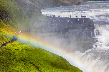 Tourists visiting iconic Gullfoss (Golden Falls), Olfusa River in southwest Iceland, Polar Regions