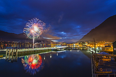 July 4th fireworks from downtown in the harbor of Juneau, Southeast Alaska, United States of America, North America