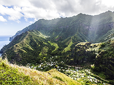 Tropical forest surrounding the town of Hanavave, Fatu Hiva, Marquesas, French Polynesia, South Pacific, Pacific