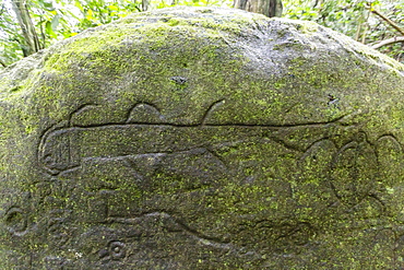 Petroglyphs carved into basalt on sacred ground at Hatiheu, Nuku Hiva, Marquesas, French Polynesia, South Pacific, Pacific