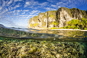 Half above and half below image of the reef at the raised coral atoll of Makatea, Tuamotus, French Polynesia, South Pacific, Pacific