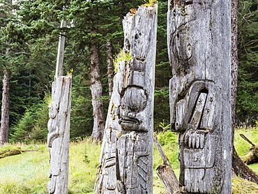 Totem poles at SGang Gwaay, UNESCO World Heritage Site, Haida Gwaii, British Columbia, Canada, North America