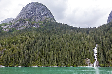 Snow-melt waterfall in Tracy Arm-Ford's Terror Wilderness area, Southeast Alaska, United States of America, North America 