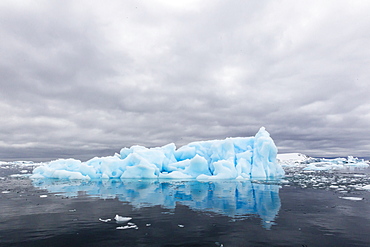 Huge blue iceberg near Petermann Island, western side of the Antarctic Peninsula, Southern Ocean, Polar Regions