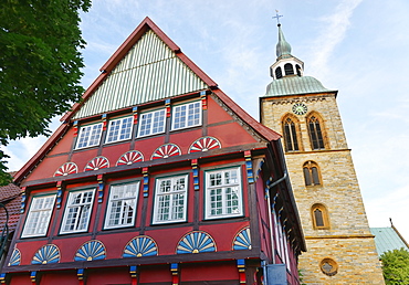 Half-timbered house and Saint Aegidius church, Rheda-Wiedenbrueck, North Rhine-Westphalia, Germany