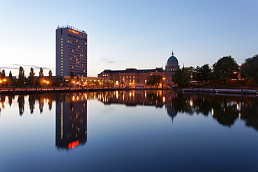 Pier of the ship company Weisse Flotte in the evening, Havel, with Hotel Mercure, Potsdam Palace and church of St. Nicholas in the background, Potsdam, Brandenburg, Germany