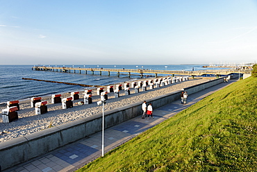 Seafront with promenade and pier in the evening, seaside resort of Kuehlungsborn at the Baltic Sea, Mecklenburg-Western Pomerania, Germany