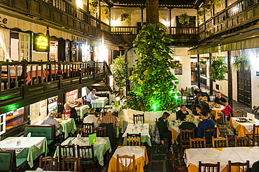 Restaurants in the courtyard, El Rincon at Plaza del Charco, historic building from 17. Century, Puerto de la Cruz, Tenerife, Canary Islands, Spain