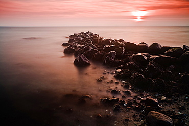 Stones in the morning light, Buelk, Strande, Kiel Fjord, Schleswig-Holstein, Germany