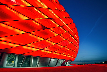 Allianz Arena at night with red light, football stadium of FC Bayern MÃ¼nchen, Munich, Bavaria, Germany, Architects Herzog and De