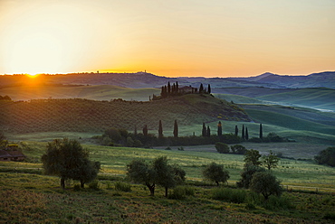 country residence and cypress trees at sunrise, near San Quirico d`Orcia, Val d`Orcia, province of Siena, Tuscany, Italy, UNESCO