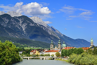 View over Inn river to Cathedral of St. James and City Tower, Karwendel with mount Bettelwurf in background, Innsbruck, Tyrol, A