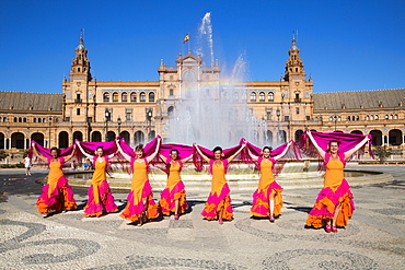 Flamenco Fuego dance group on Plaza de Espana in front of the fountain, Seville, Andalusia, Spain