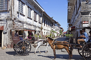 Horse drawn carriages in the historical city of Vigan City, UNESCO World Heritage Site, Ilocos Sur province, on the main island 