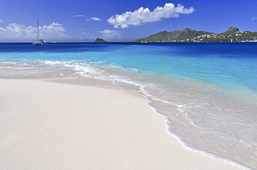 Beach with waves, sailing ship and view to Union Island, sea, Palm Island, St. Vincent, Saint Vincent and the Grenadines, Lesser Antilles, West Indies, Windward Islands, Antilles, Caribbean, Central America