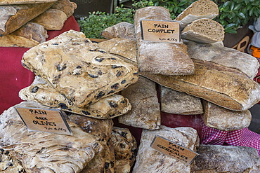 Olive bread on the market stall in Lourmarin, Provence-Alpes-Cote d’Azur, France