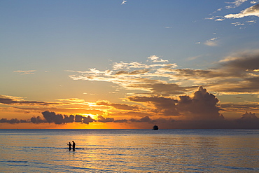 People bathing in the water at Meeru Island Resort, Meerufenfushi, North-Male-Atoll, Maldives