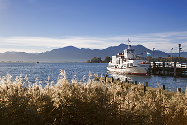 Excursion ship at the landing stage, near Gstadt, Chiemsee, Chiemgau region, Bavaria, Germany