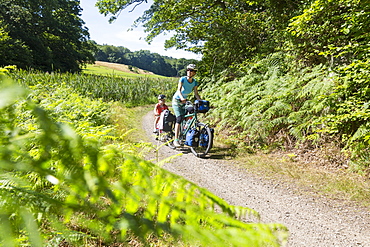 Mother and son on a bicycle tour, Baltic sea, MR, Bornholm, near Allinge, Denmark, Europe