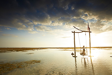 Beach swing at low tide, Gili Trawangan, Lombok, Indonesia