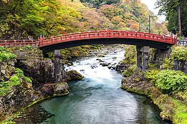 Wooden red bridge named Shinkyo over river Daiya in Nikko, Tochigi Prefecture, Japan