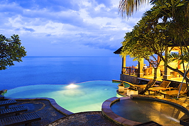 Hotel complex with pool in the evening, Amed, Bali, Indonesia