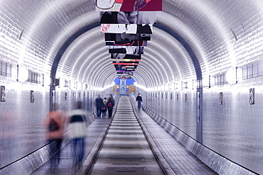 Pedestrians in the Old Elbe Tunnel, Hamburg, Germany